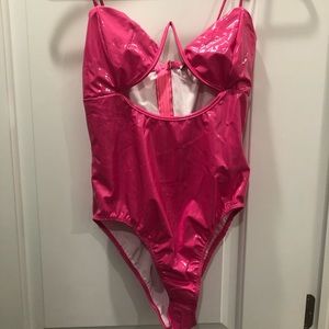 Pink latex cutout bodysuit